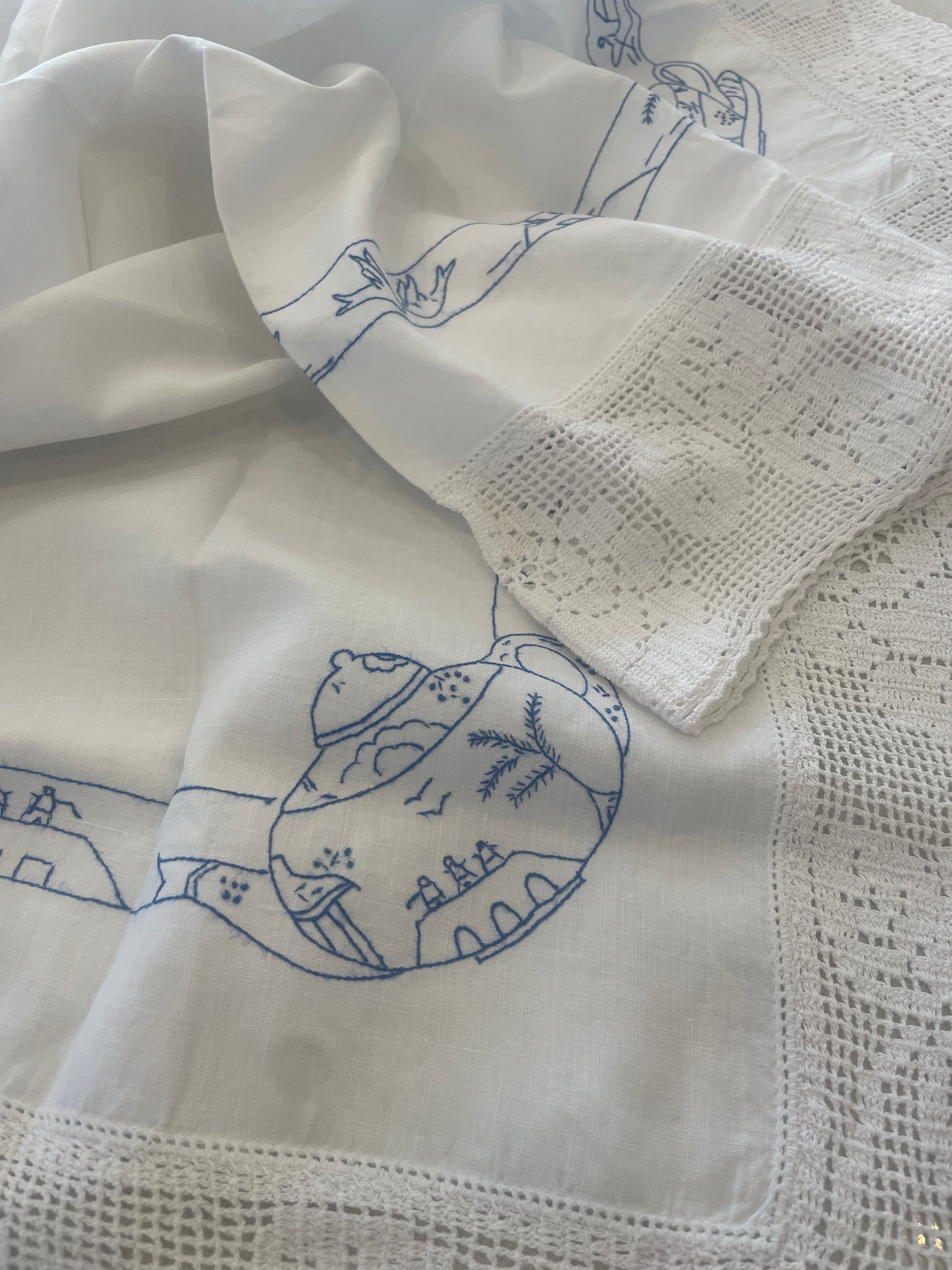 Blue birds hand embroidered tea cloth