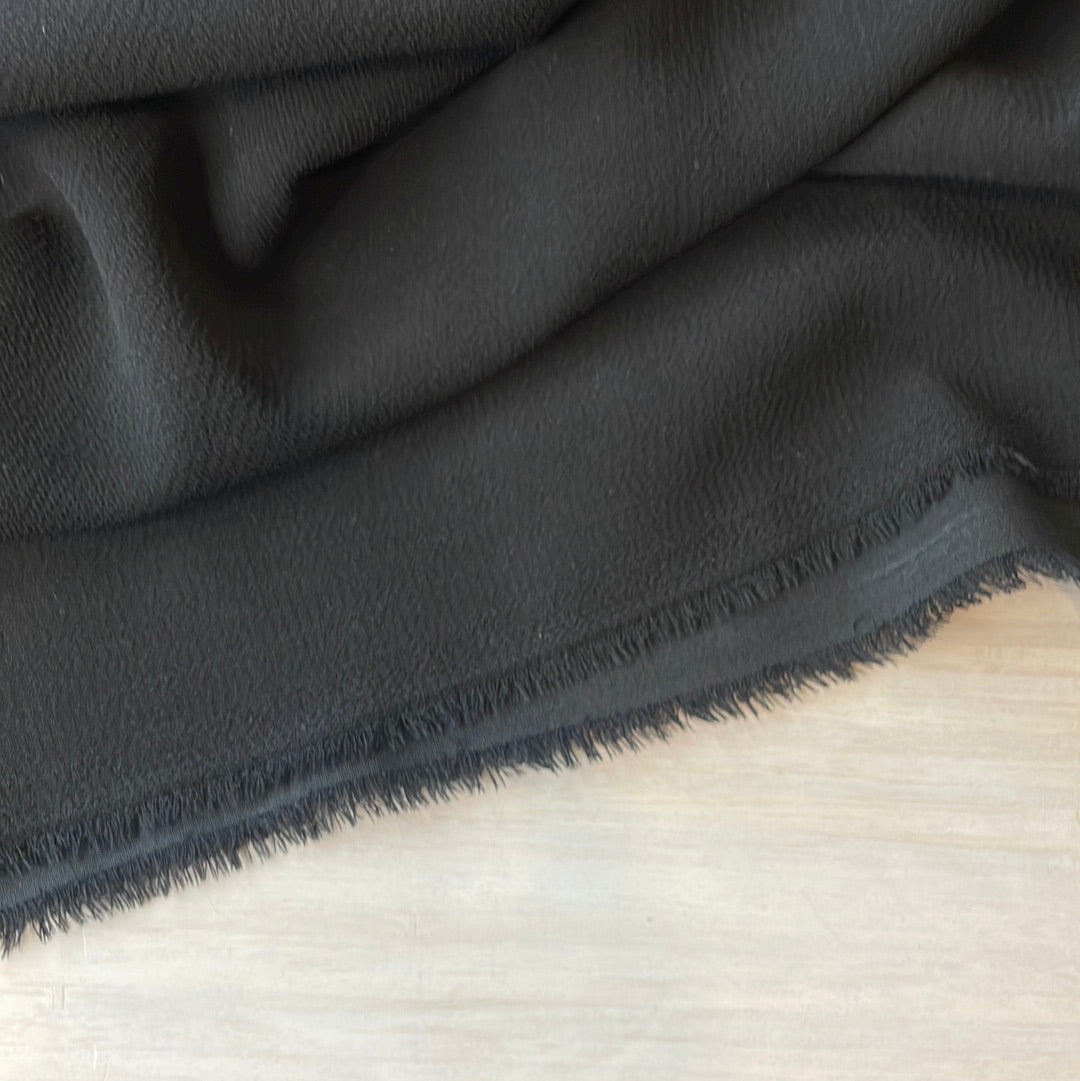 Black heavy drape mechanical stretch crepe