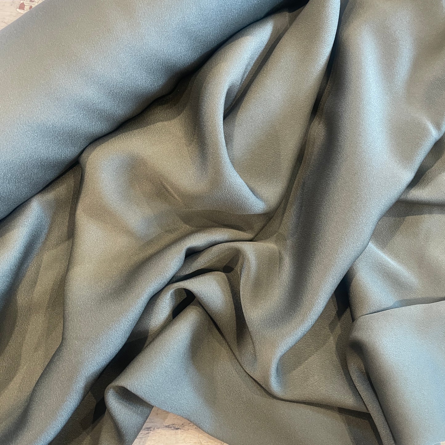 Woodland green stretch satin