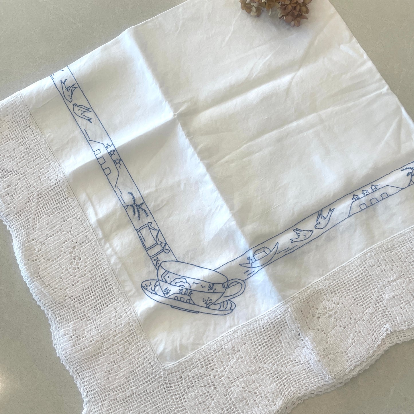 Blue birds hand embroidered tea cloth