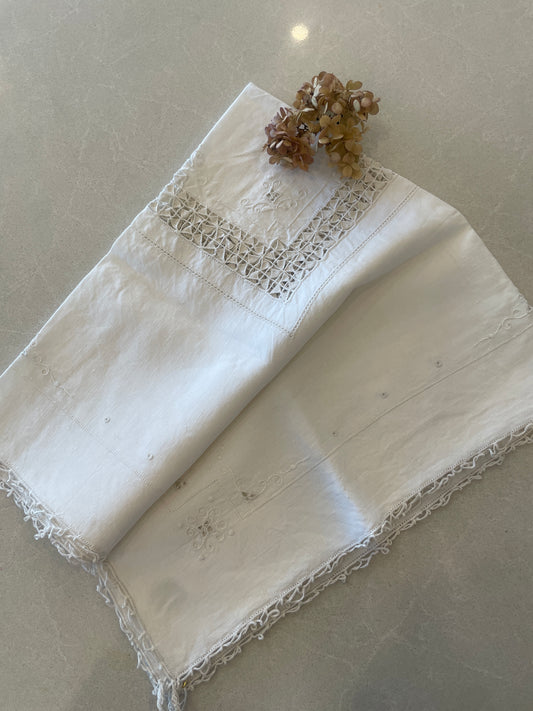 Ivory embroidered tea cloth