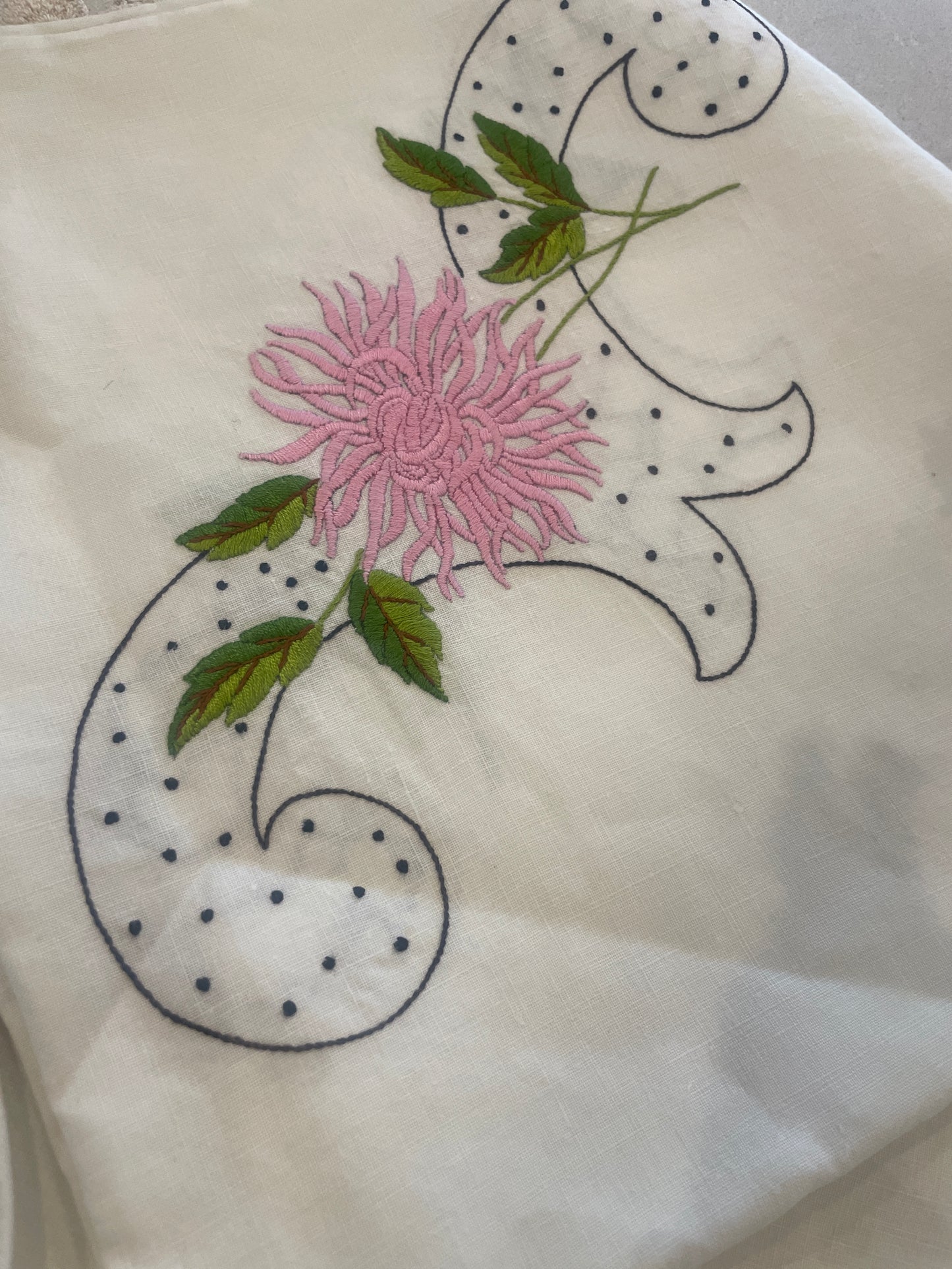 Beautiful embroidered linen cloth with hand crochet border