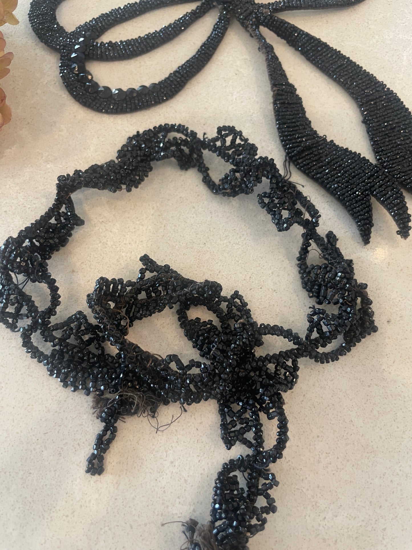 Edwardian jet bead motif and trims salvaged from a dress
