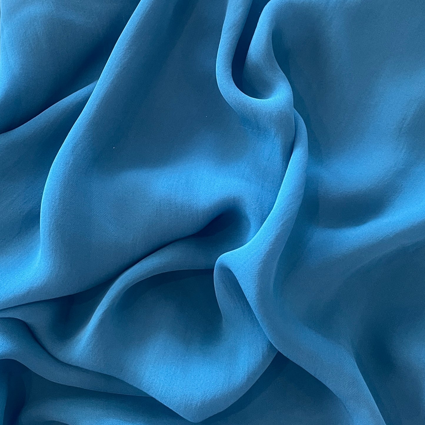1.4m aqua sand-washed silk triple georgette
