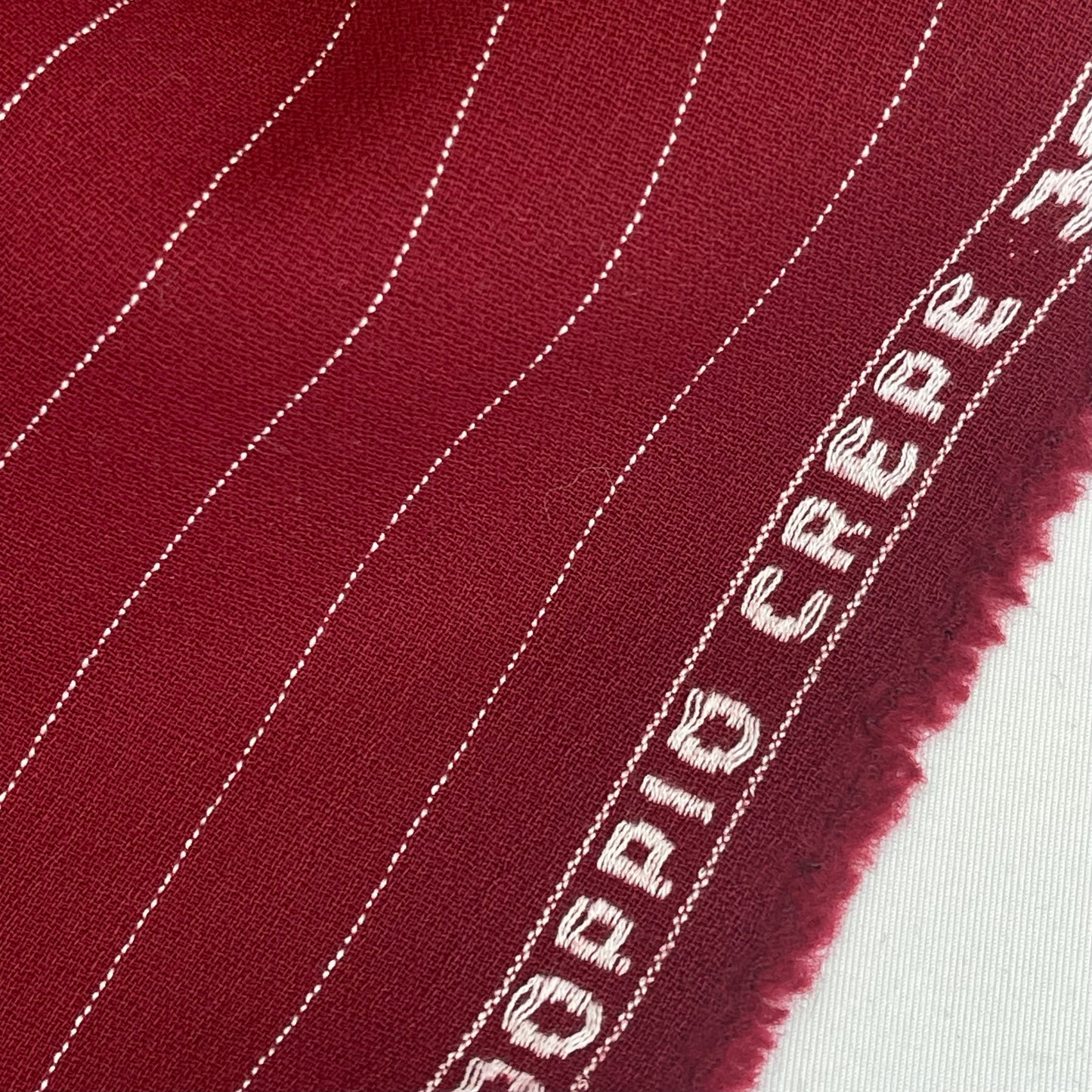 Ruby Pinstripe Cadena Doppio Wool Crepe