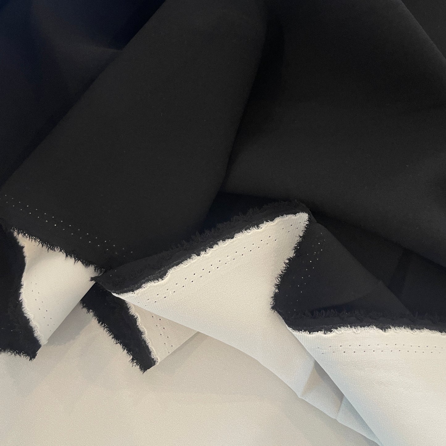 Black white bonded reversible stretch crepe suiting