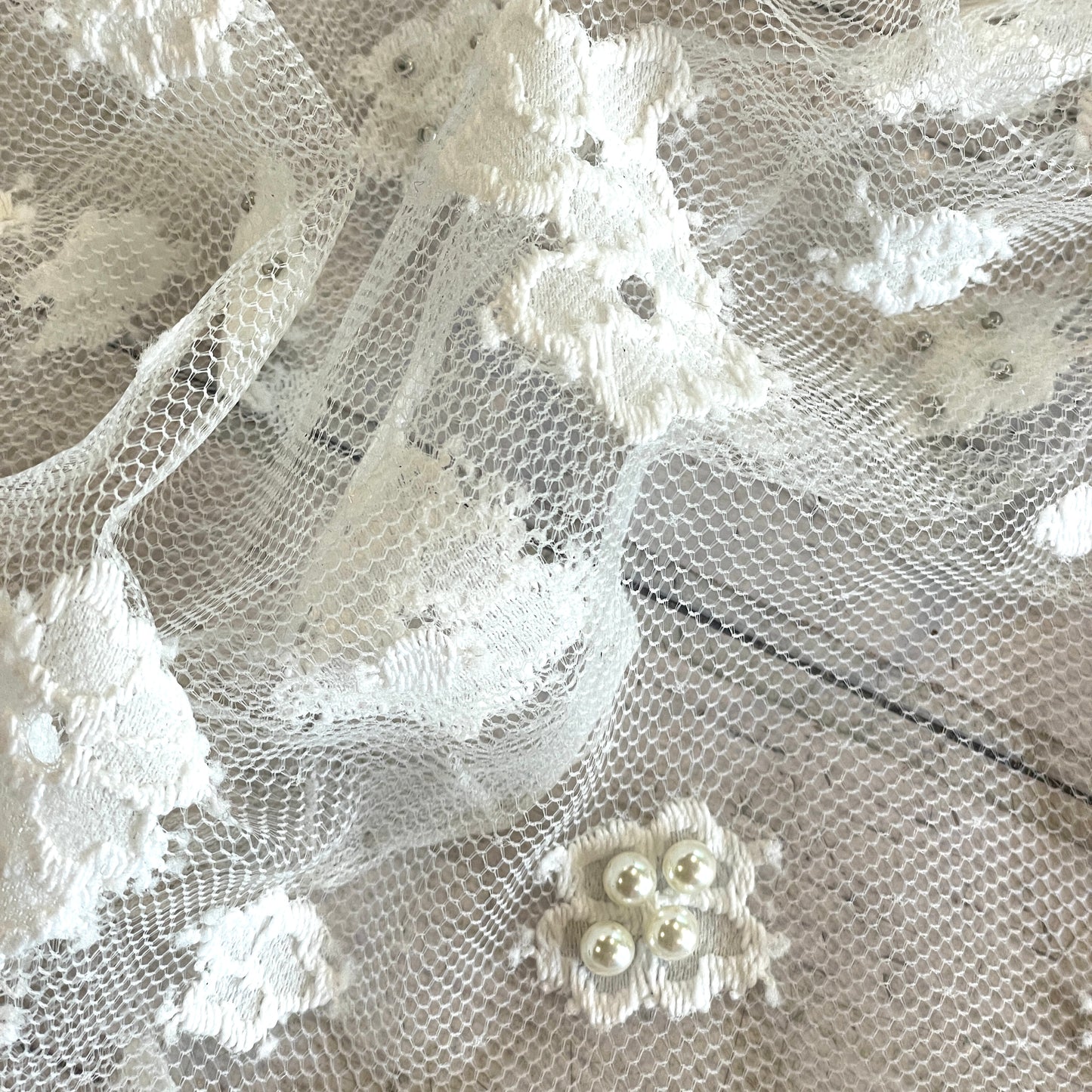 Scattered daisy pearl encrusted lace