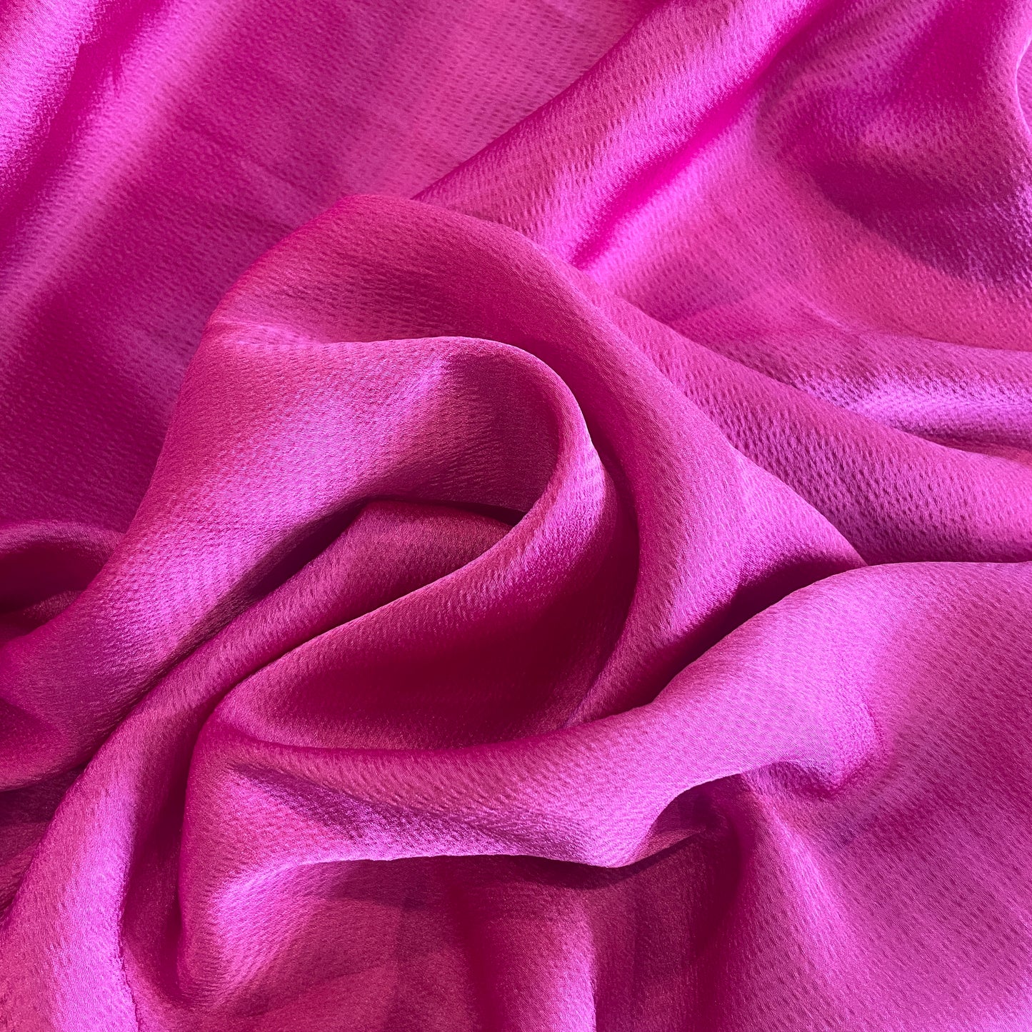 Hot pink textured stretch viscose satin