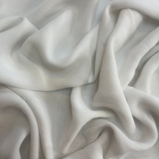 Angelic white triple crepe viscose georgette