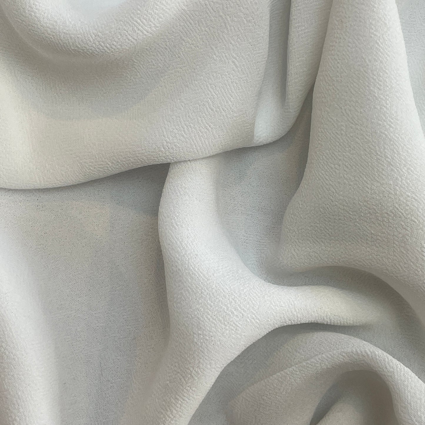 Angelic white triple crepe viscose georgette