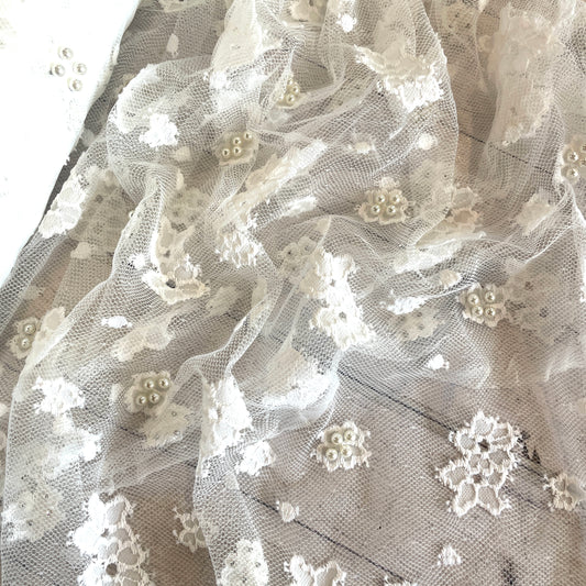 Scattered daisy pearl encrusted lace