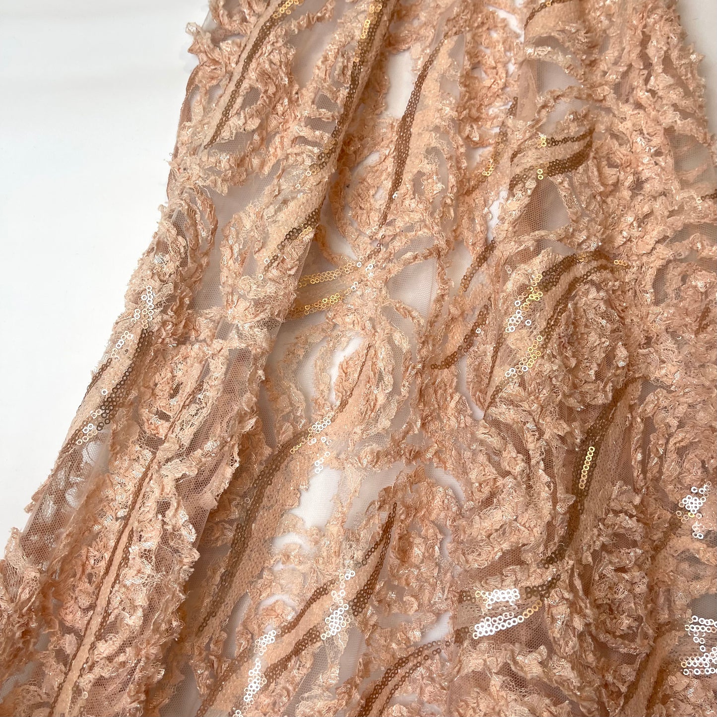 Blush pink textured rose sequin mesh