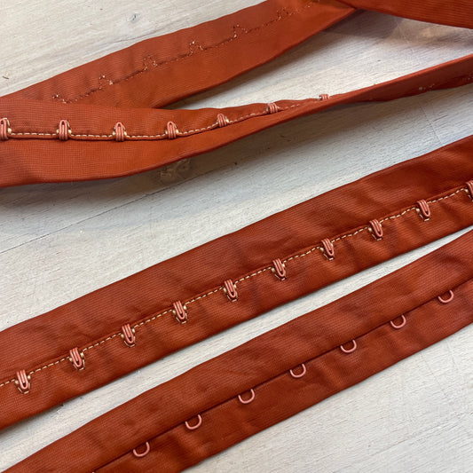 Rust hook and eye tape