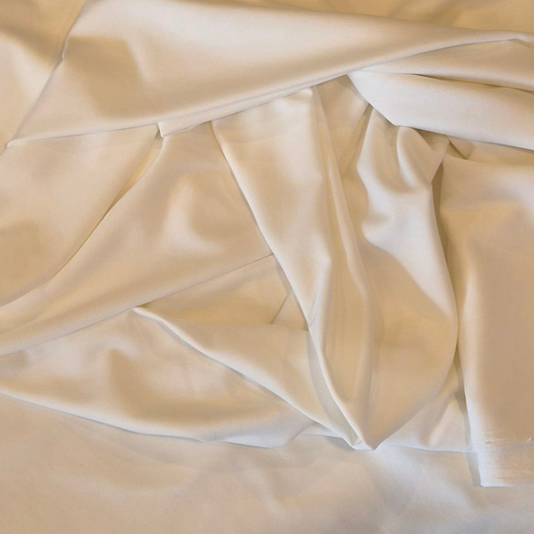 1.5m Ivory slinky jersey