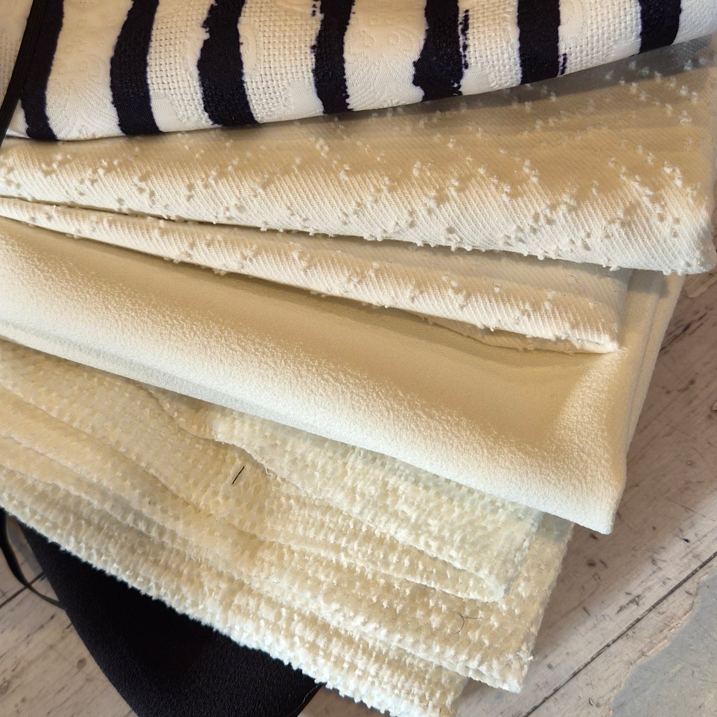 31. 5m Assorted poly brocade, woven stretch satin, crepe suiting, textured cotton