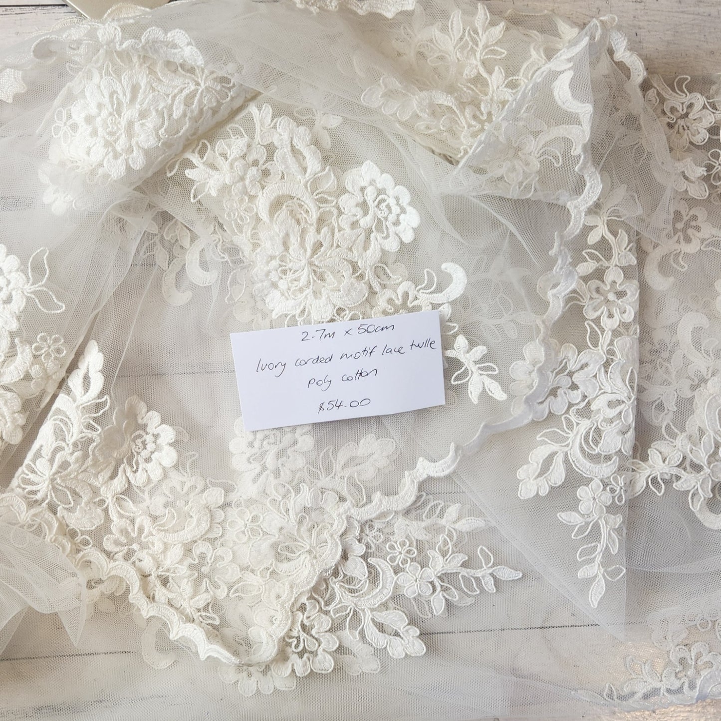 2.7m Ivory corded motif lace tulle