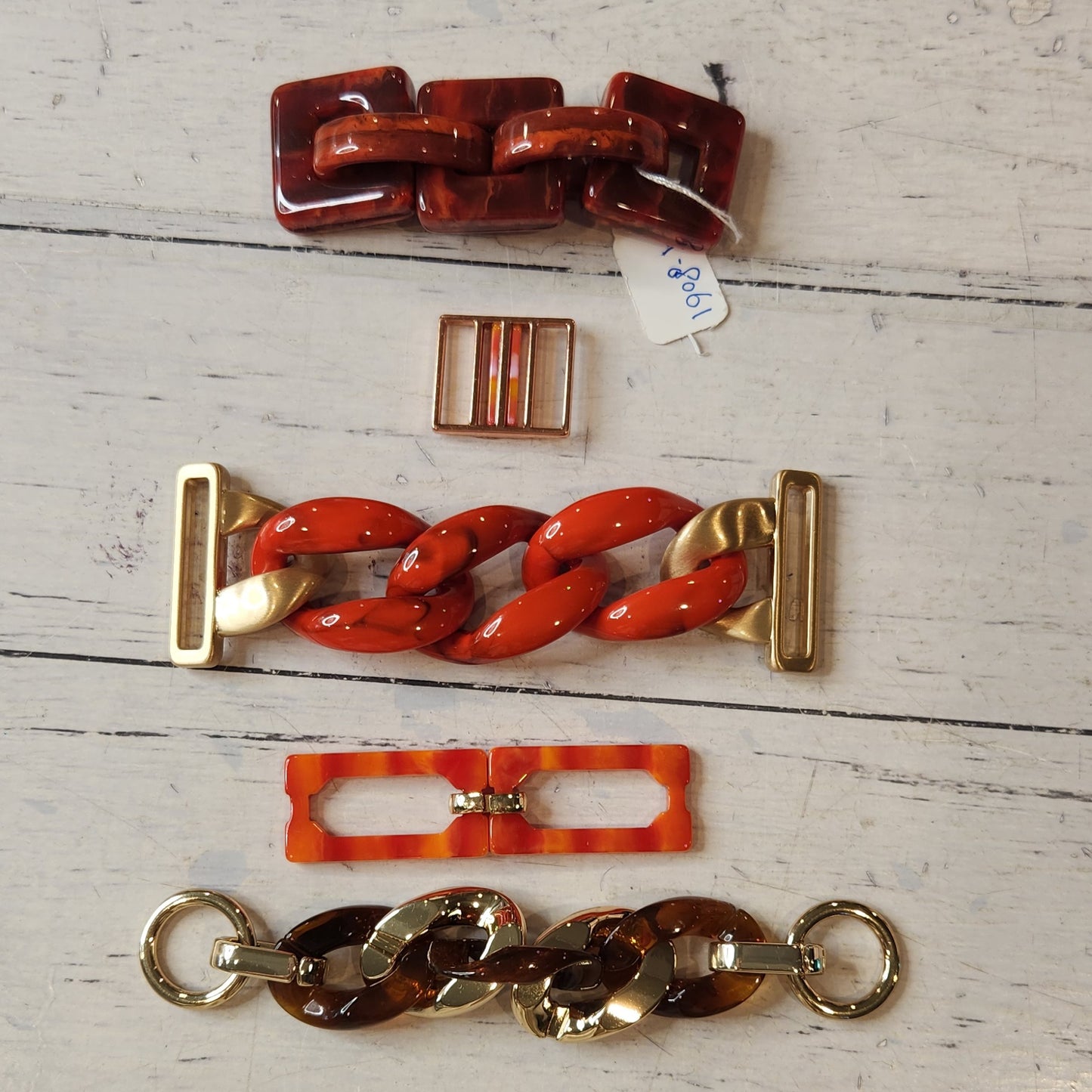 20. Collection of metal and plastic embellishments