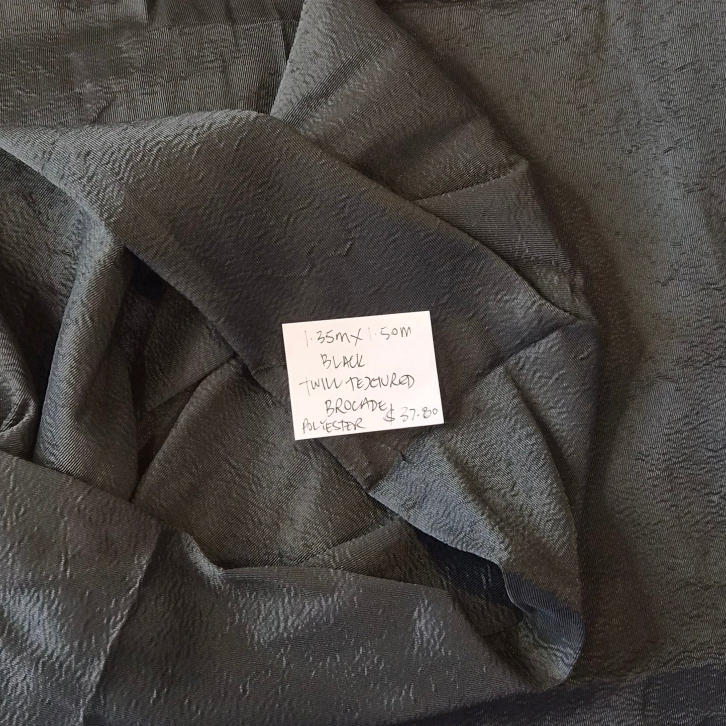 1.35m Black twill textured brocade