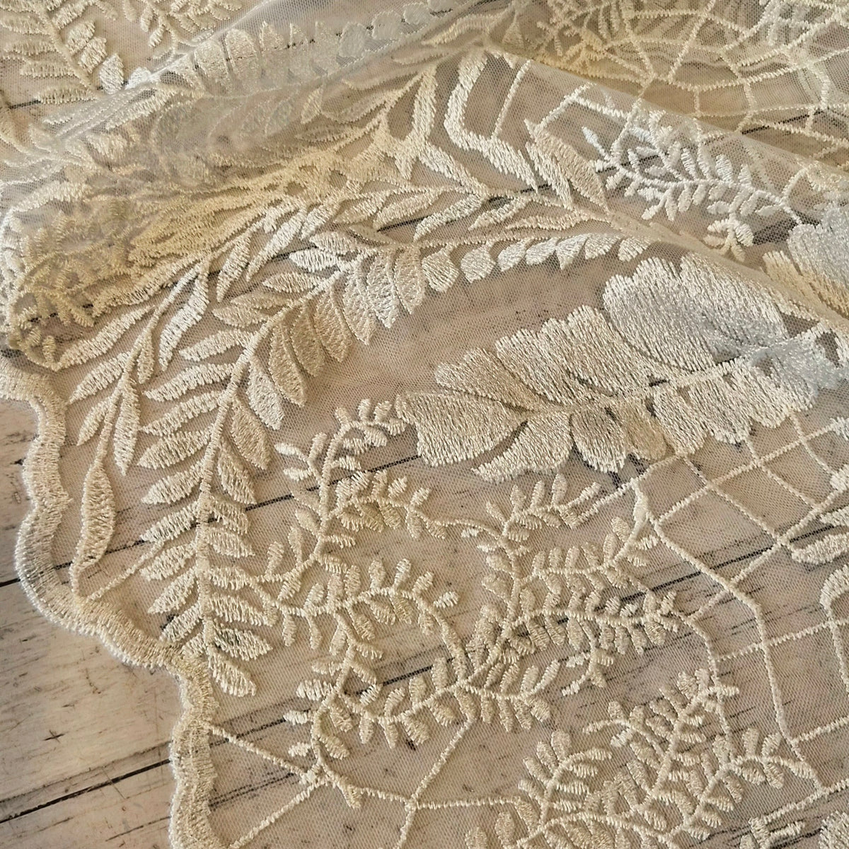 Ivory leaves and vines lace