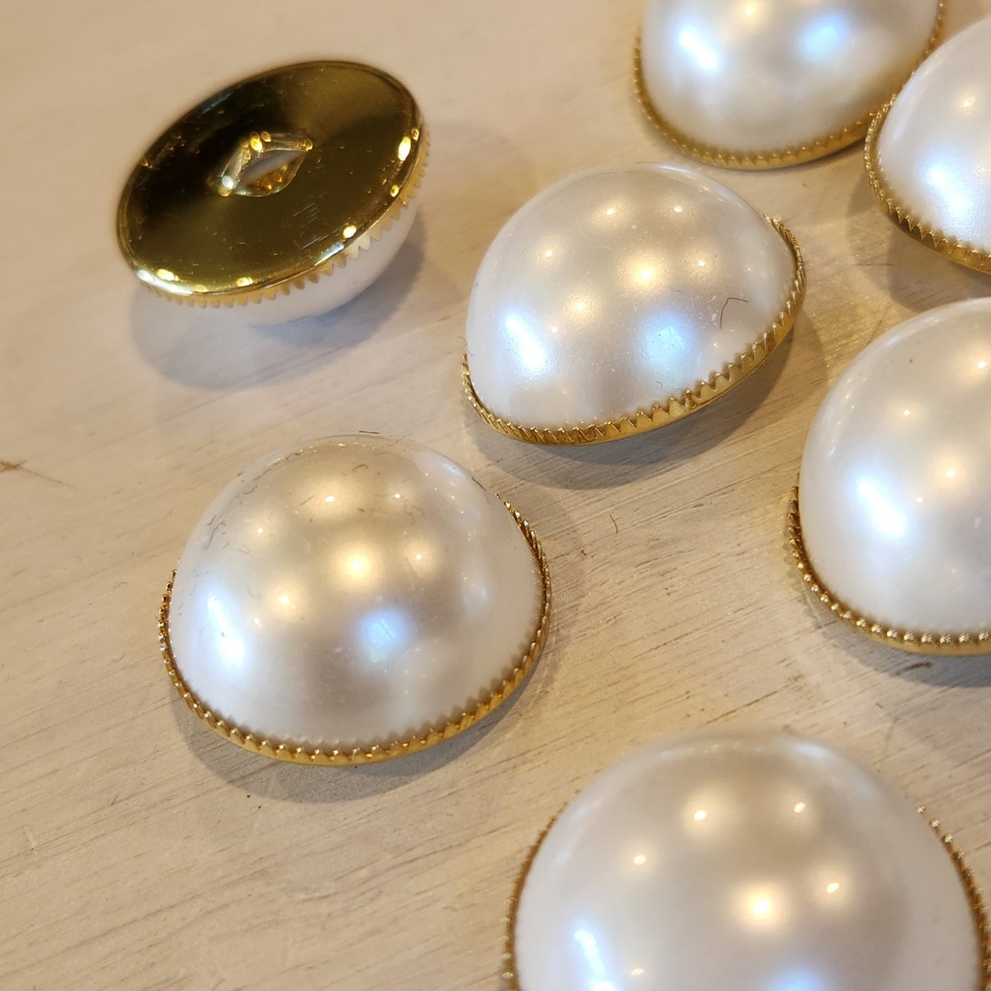 Pearl dome button
