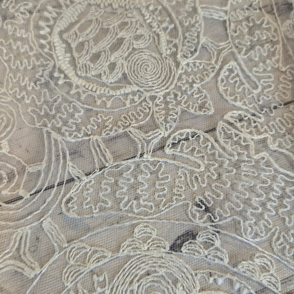 Spider spun web lace