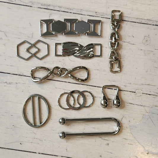 12. Collection of metal embellishments