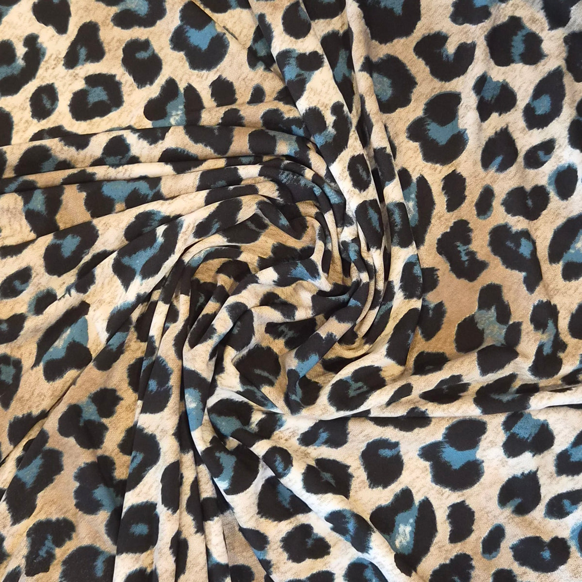 Teal leopard jersey knit