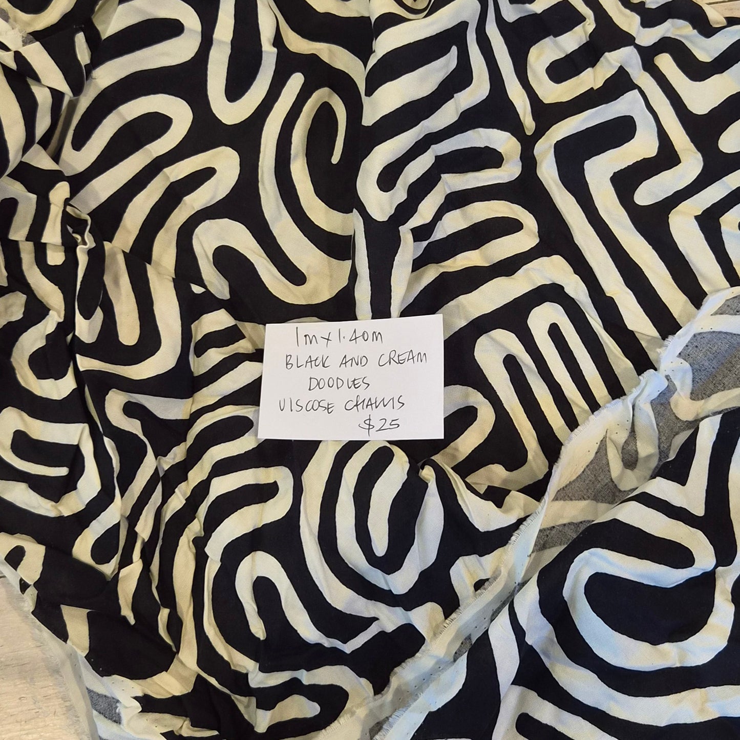 1m Black and cream doodles viscose challis