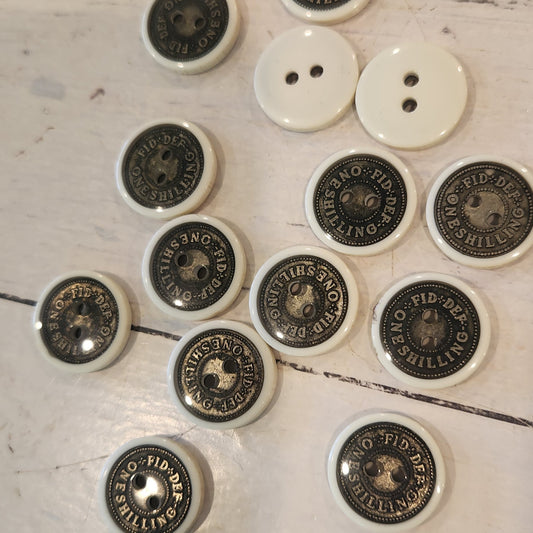 One schilling 17mm button