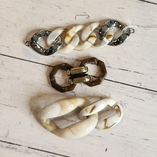 Collection of metal and plastic embellishments