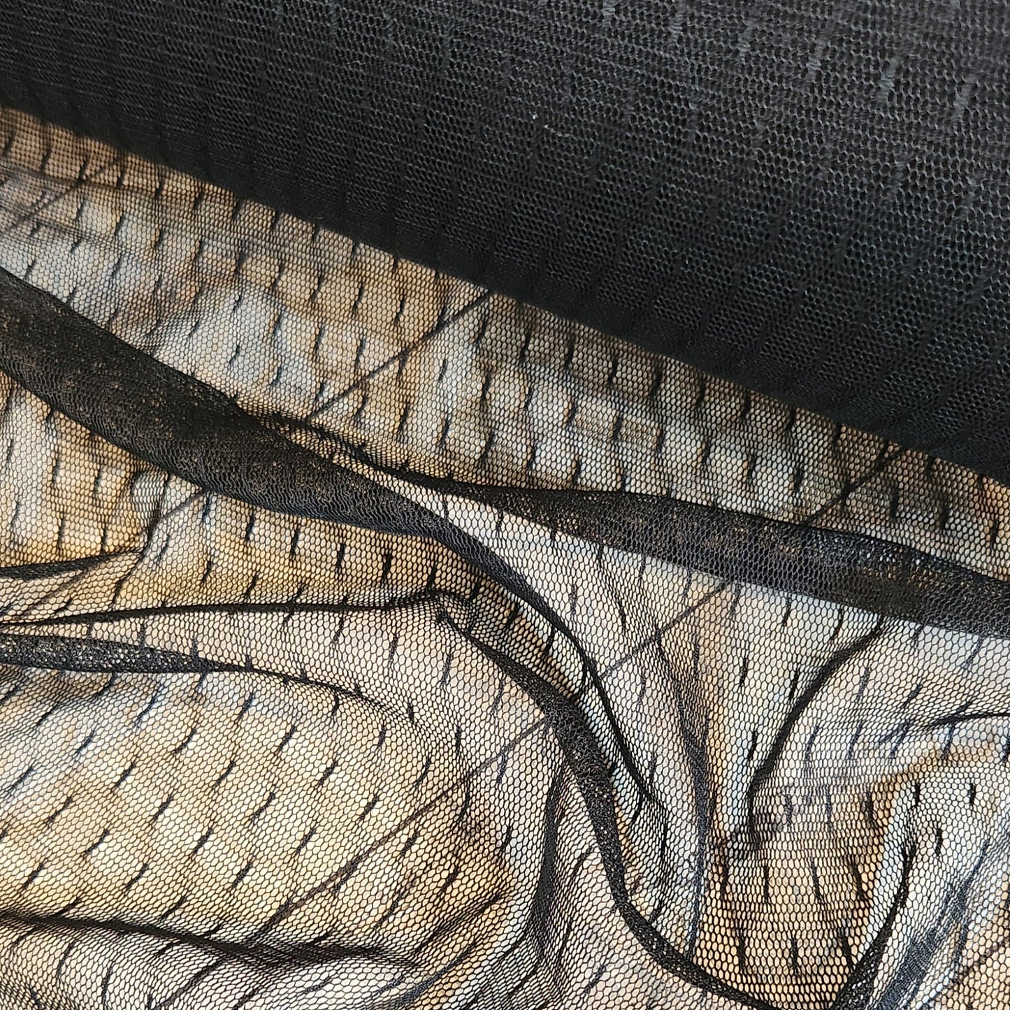 Black delicate long spot mesh