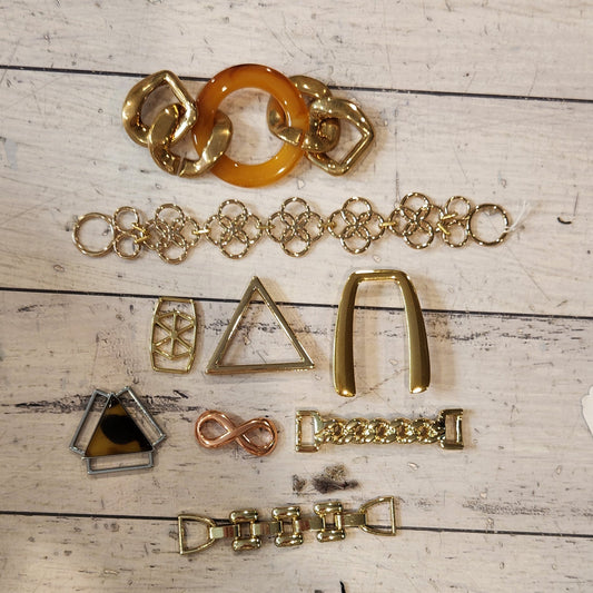 17. Collection of metal embellishments
