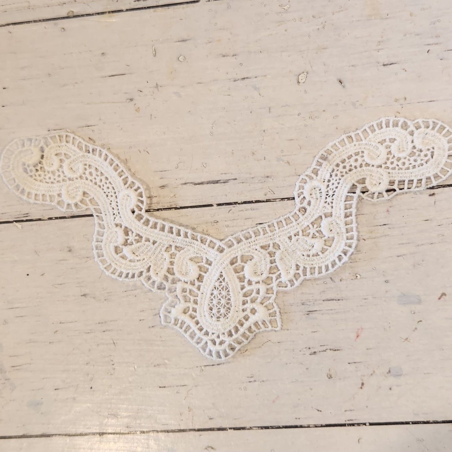 28. White cotton embroidered piece