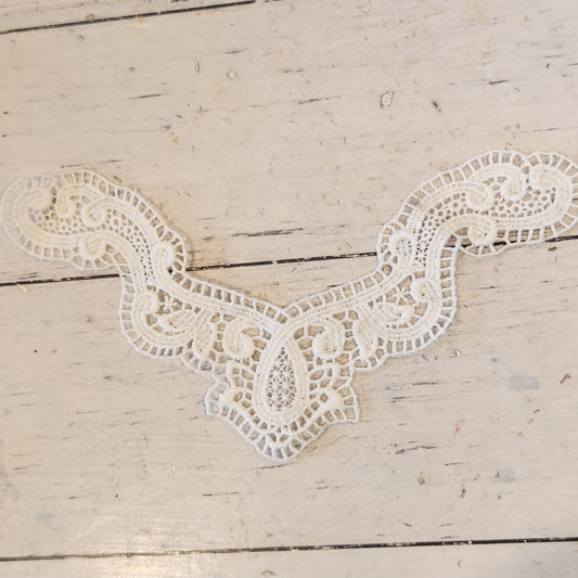 28. White cotton embroidered piece