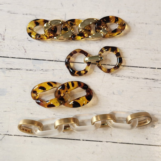 Collection of metal and plastic embellishments