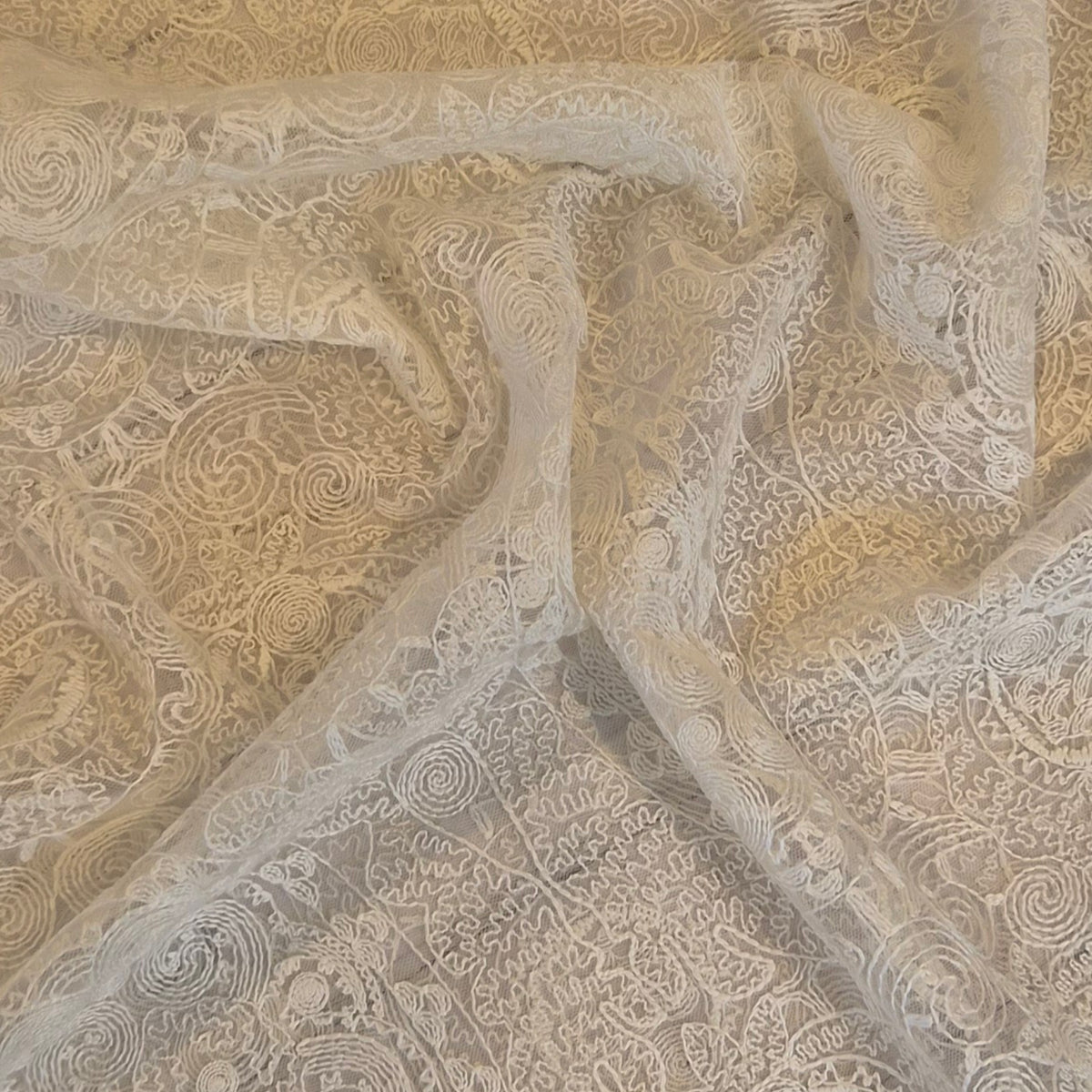 Spider spun web lace