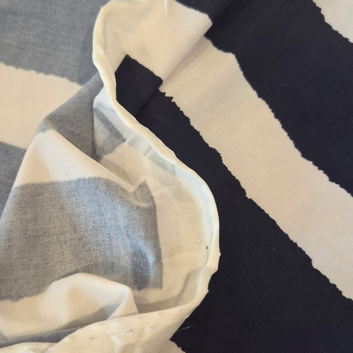 Uneven navy stripe jersey knit