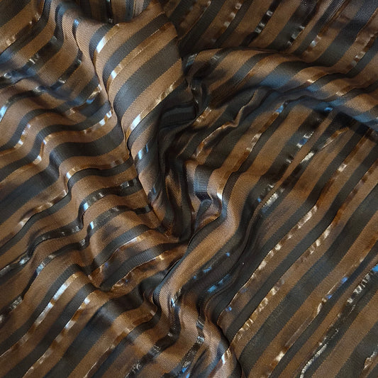 Rich Brown pleated suiting