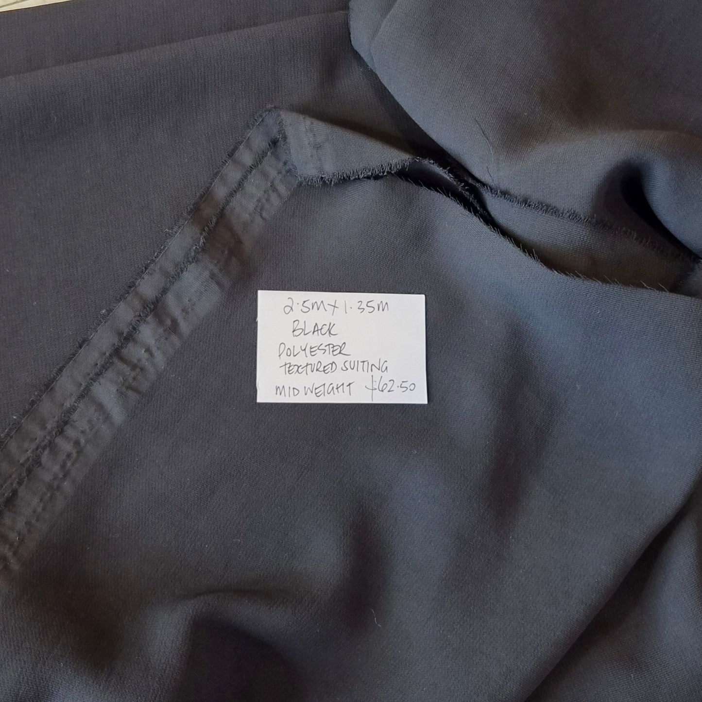 2.5m Black polyester textured suiting