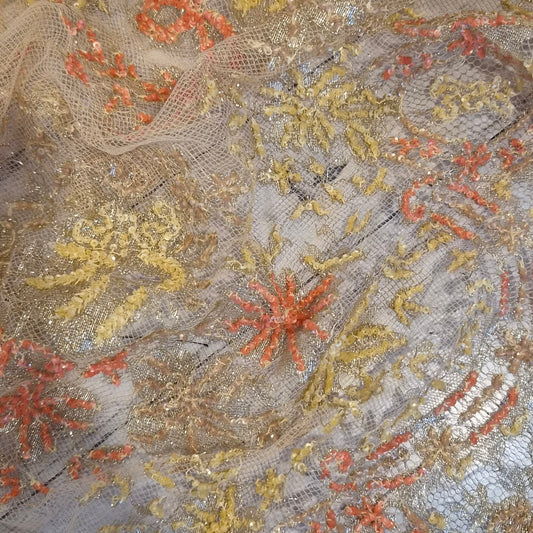 Orange and gold sequined lace