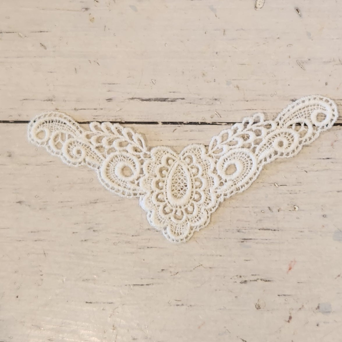 27. White cotton embroidered piece