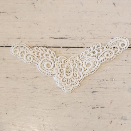 27. White cotton embroidered piece