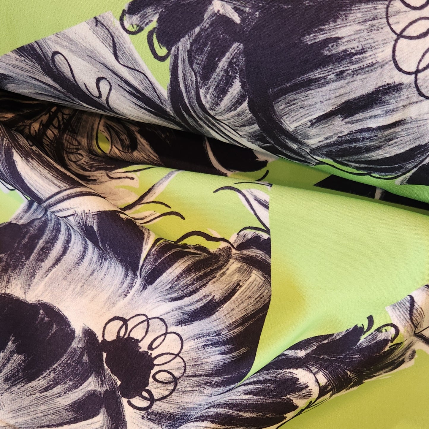 Lime and floral collage bonded suiting