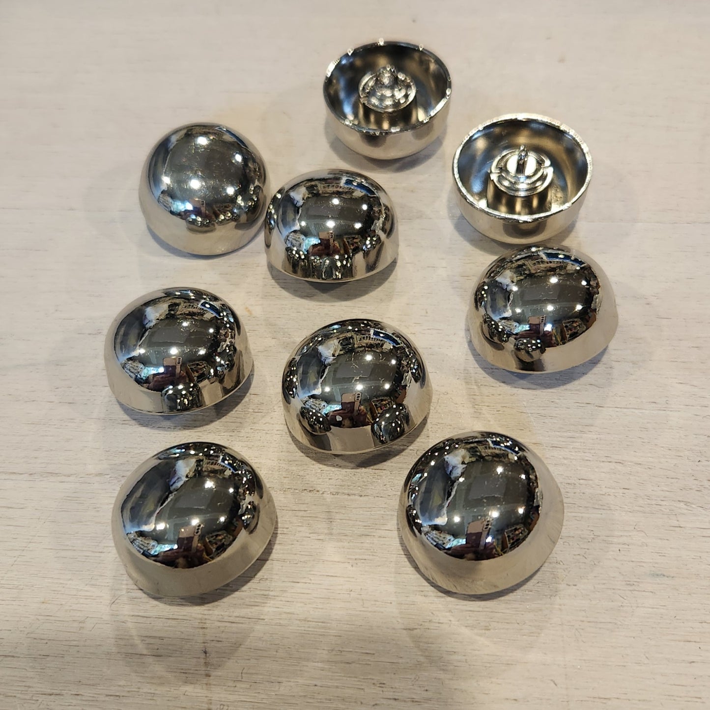 Silver hub button