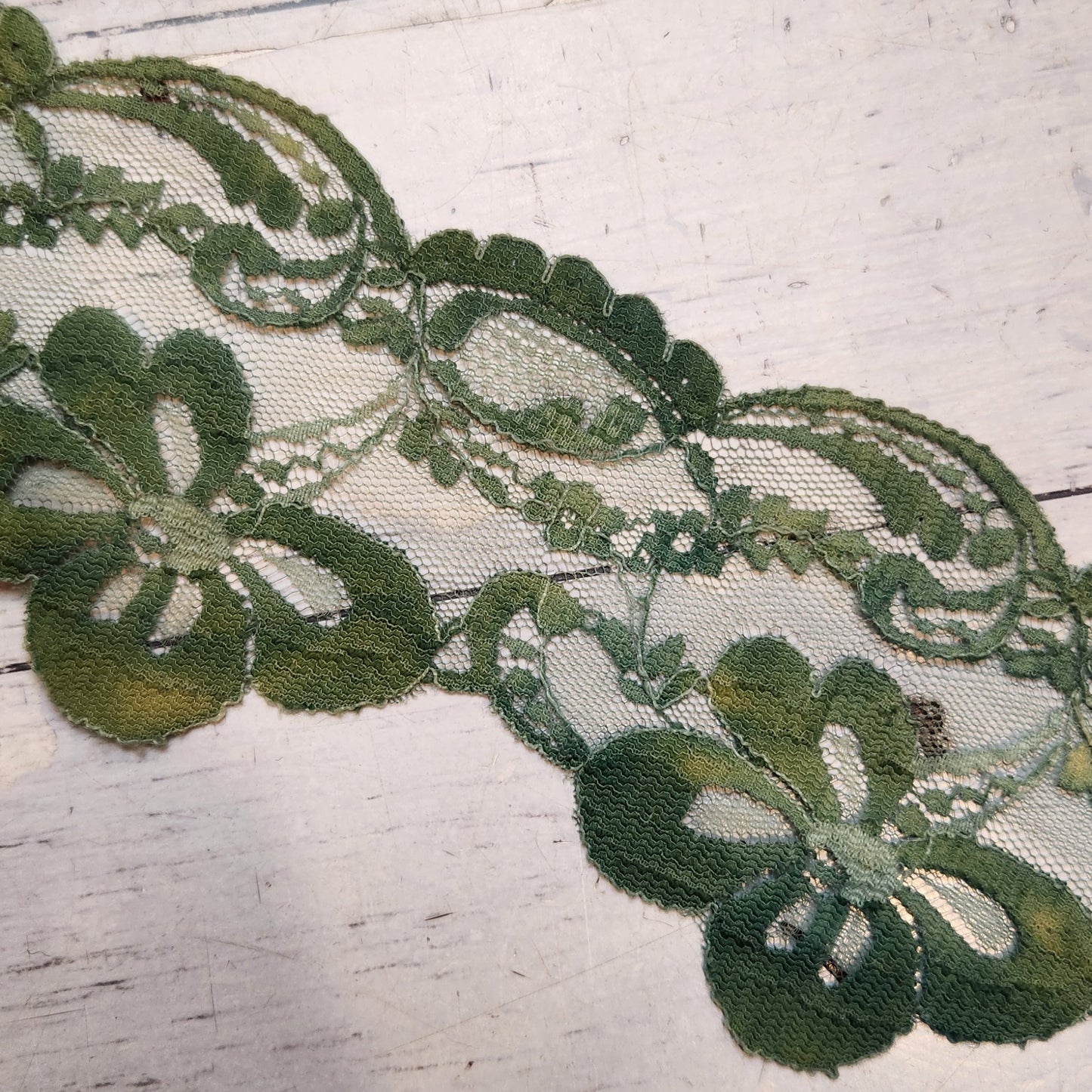 Dappled green floral lace