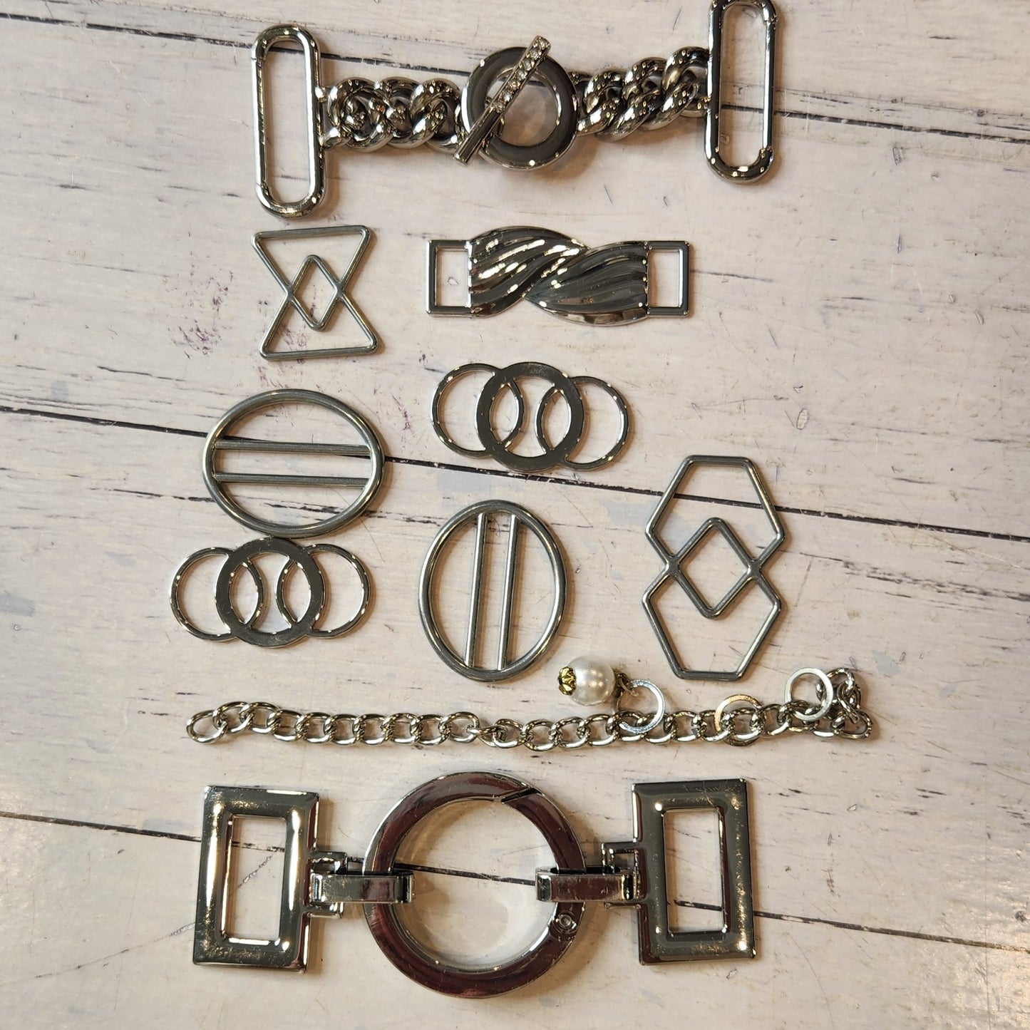13. Collection of metal embellishments