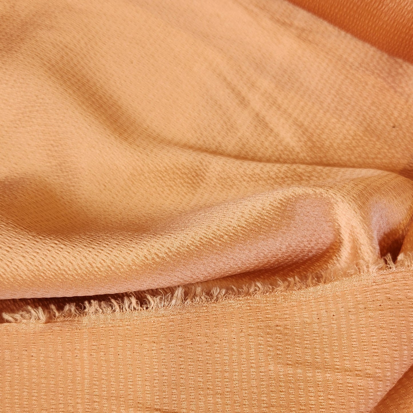 Salmon textured stretch viscose satin