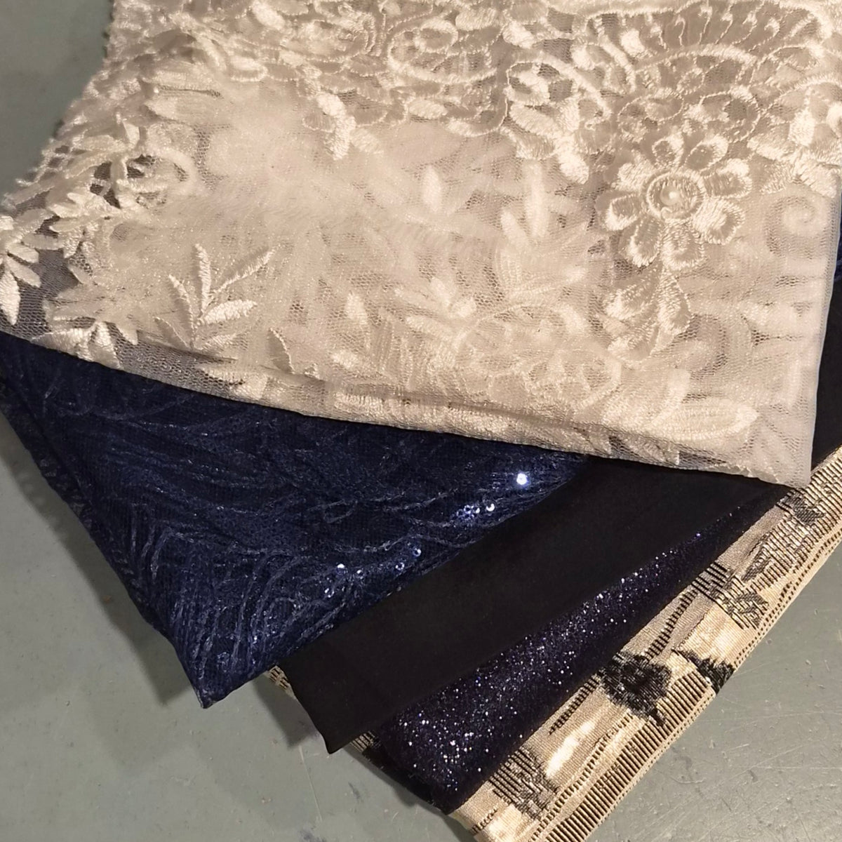 49. 5 pieces assorted brocade, sequin mesh and lace mesh