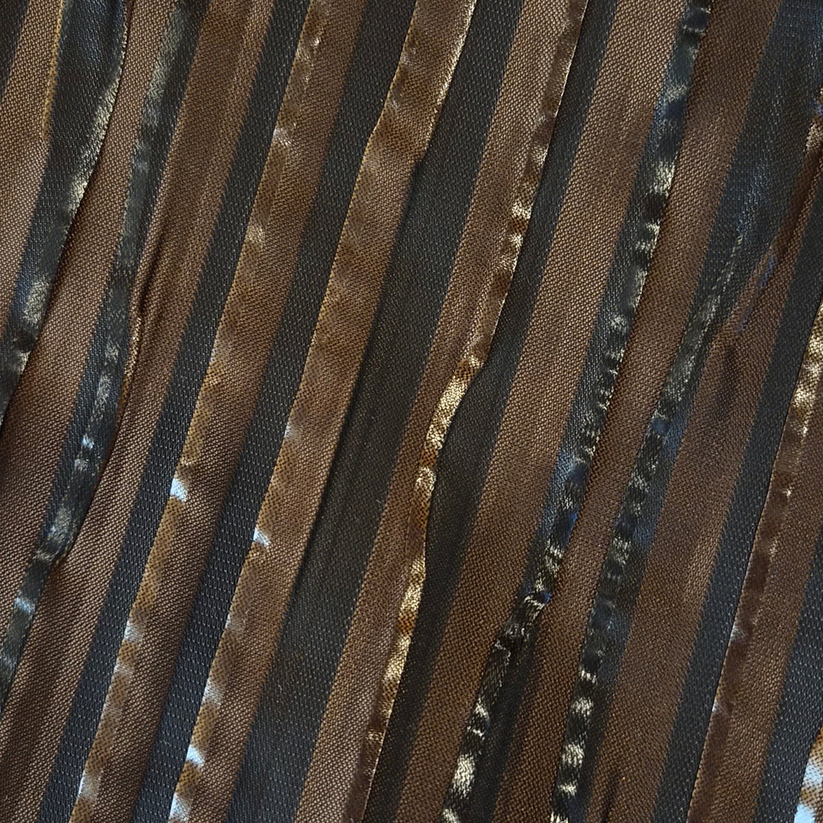 Rich Brown pleated suiting