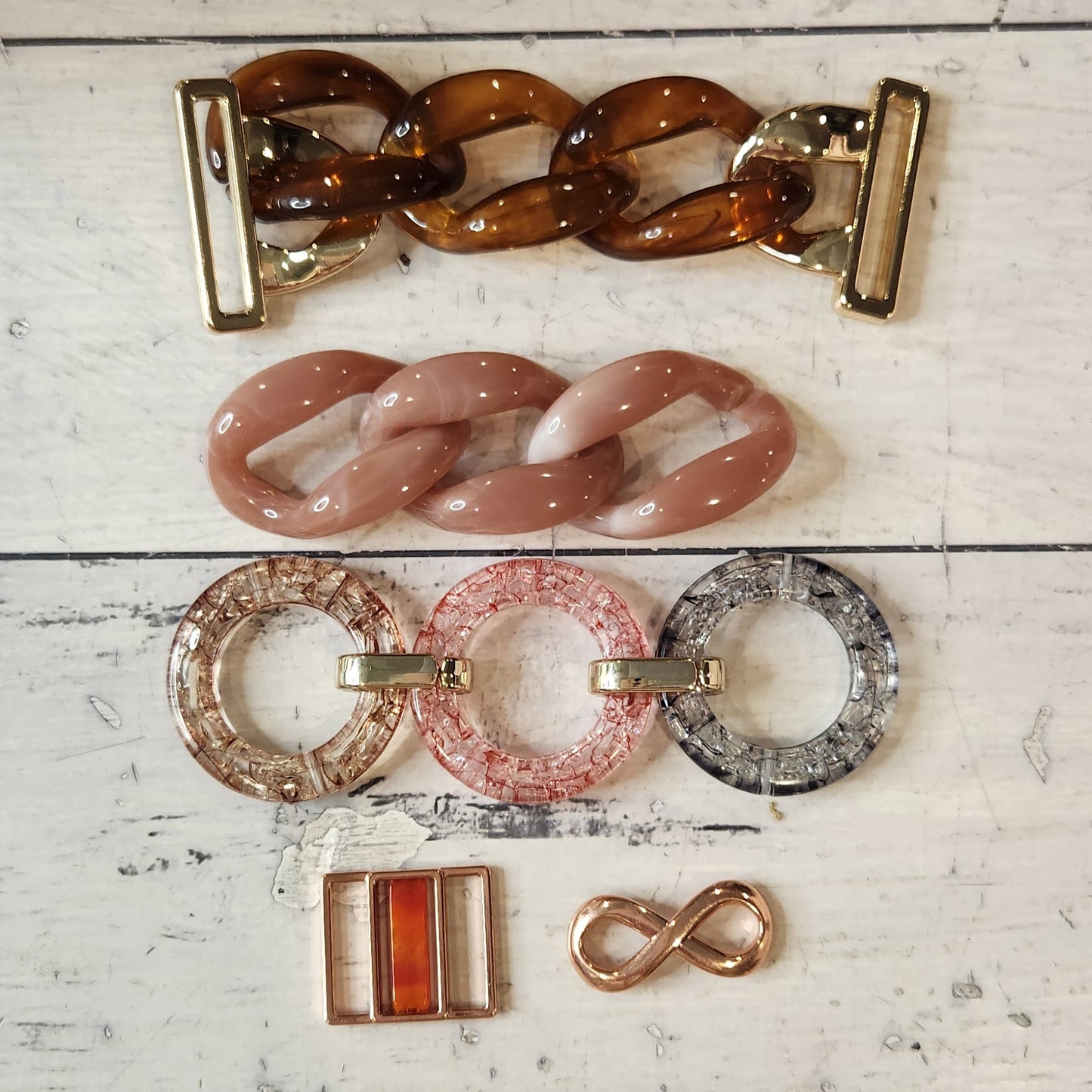 22. Collection of metal and plastic embellishments